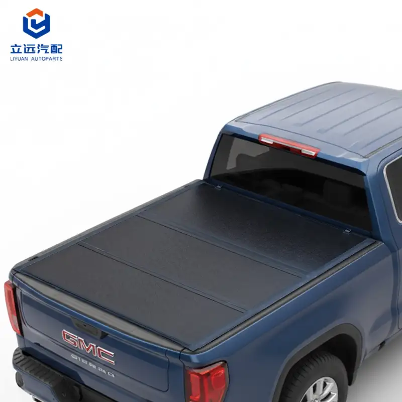 Nízkoprofilový pevný Tri-Fold kryt tonneau pro GMC